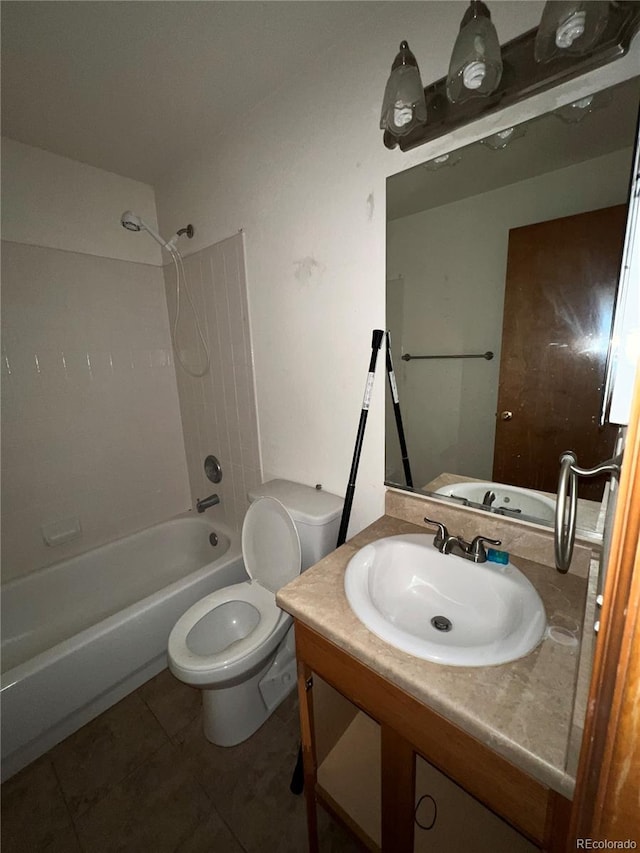 full bathroom featuring tile patterned floors, vanity, toilet, and washtub / shower combination