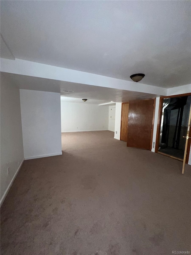 basement with carpet floors