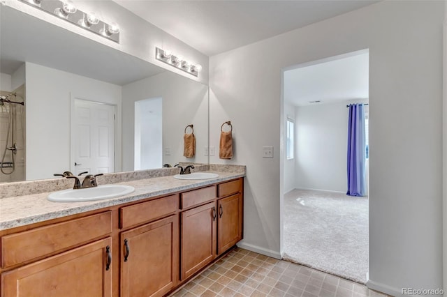 3599 Makley Cir, Castle Rock, CO 80104 - bathroom featuring double vanity and baseboards