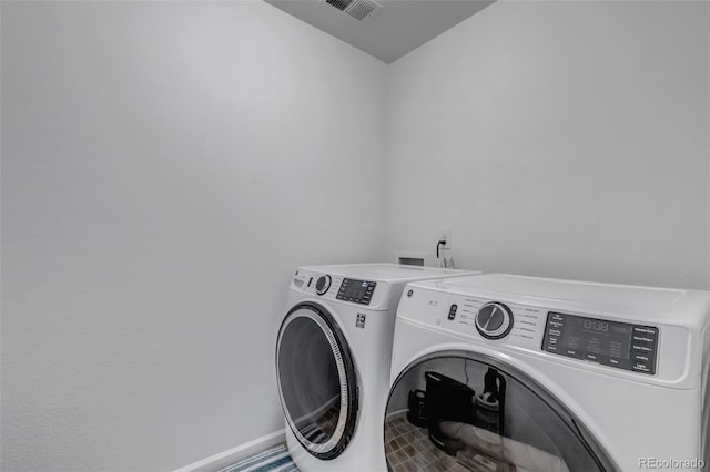 3599 Makley Cir, Castle Rock, CO 80104 - laundry room featuring separate washer and dryer and baseboards