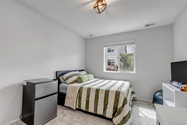 3599 Makley Cir, Castle Rock, CO 80104 - bedroom with freestanding refrigerator and light colored carpet