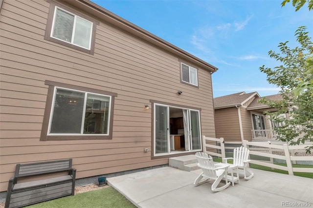 3599 Makley Cir, Castle Rock, CO 80104 - rear view of house featuring a patio