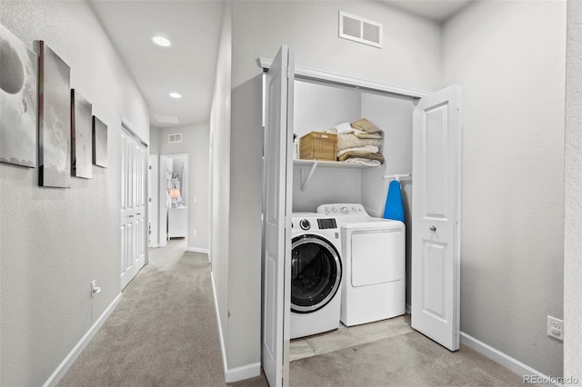 15503 W 65th Ave Unit C, Arvada, CO 80007 - laundry area with independent washer and dryer, carpet flooring, and recessed lighting