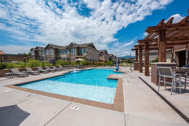 15503 W 65th Ave Unit C, Arvada, CO 80007 - community pool featuring a pergola, a residential view, a patio, and a hot tub