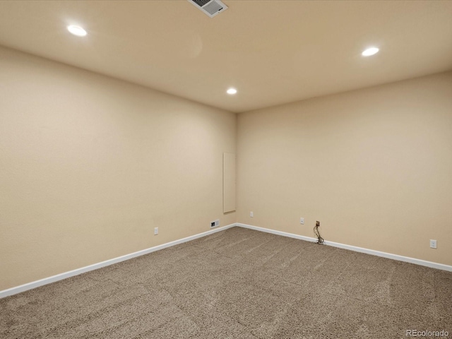 10730 Hillrose St, Parker, CO 80134 - unfurnished room featuring recessed lighting, dark colored carpet, and baseboards