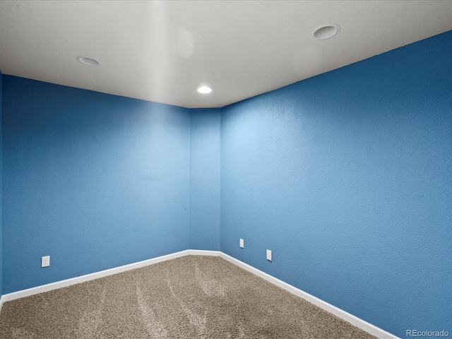 10730 Hillrose St, Parker, CO 80134 - carpeted empty room featuring baseboards and recessed lighting