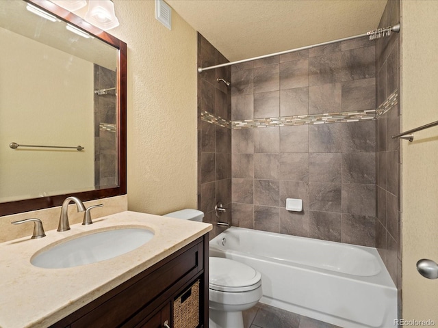 10730 Hillrose St, Parker, CO 80134 - full bath featuring a textured wall, bathing tub / shower combination, toilet, a textured ceiling, and vanity
