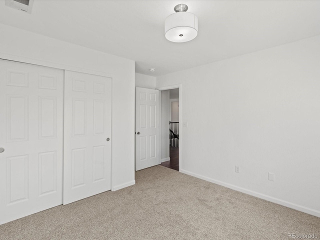 10730 Hillrose St, Parker, CO 80134 - unfurnished bedroom featuring carpet, baseboards, and a closet