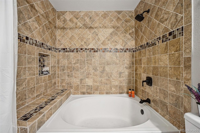 bathroom featuring shower / tub combo with curtain