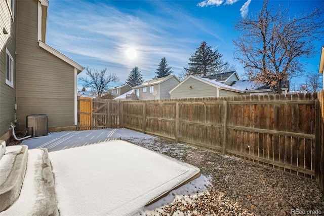 view of yard layered in snow