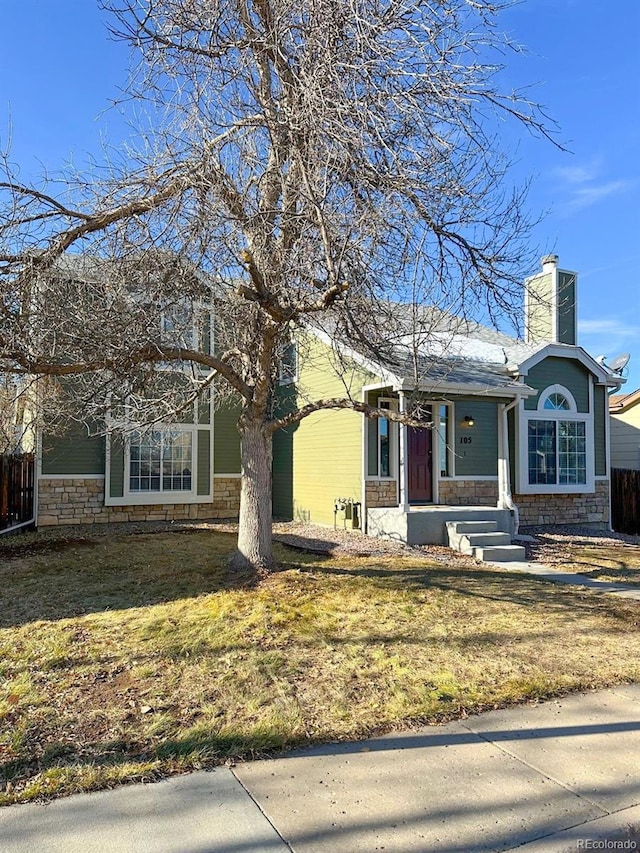 view of front of home with a front yard