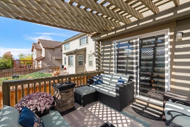 deck featuring a pergola and fence