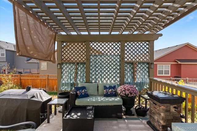 view of patio with outdoor lounge area, fence, a pergola, and grilling area