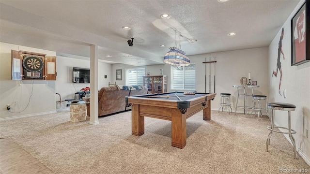 playroom featuring carpet floors, a textured ceiling, and pool table