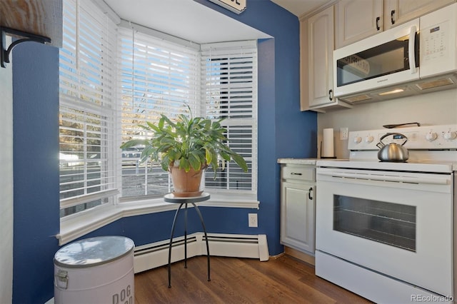 kitchen with dark hardwood / wood-style flooring, white appliances, and baseboard heating