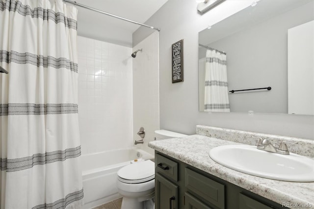 full bathroom with vanity, toilet, and shower / bath combo