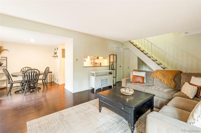 living room with dark wood-type flooring