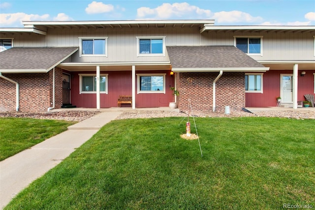 view of front of home with a front yard