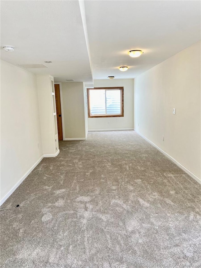 empty room featuring carpet flooring