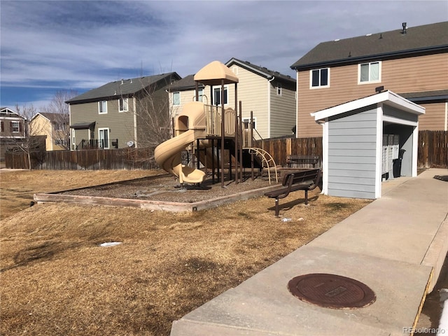 view of play area featuring a shed