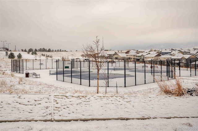 exterior space featuring fence and a residential view