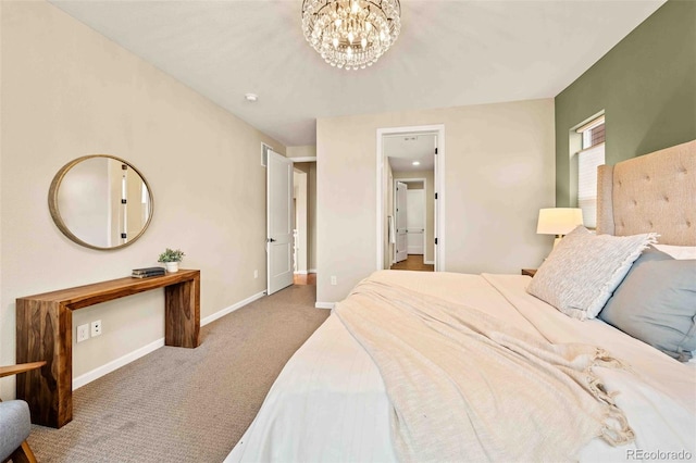 bedroom with a chandelier, carpet flooring, and baseboards