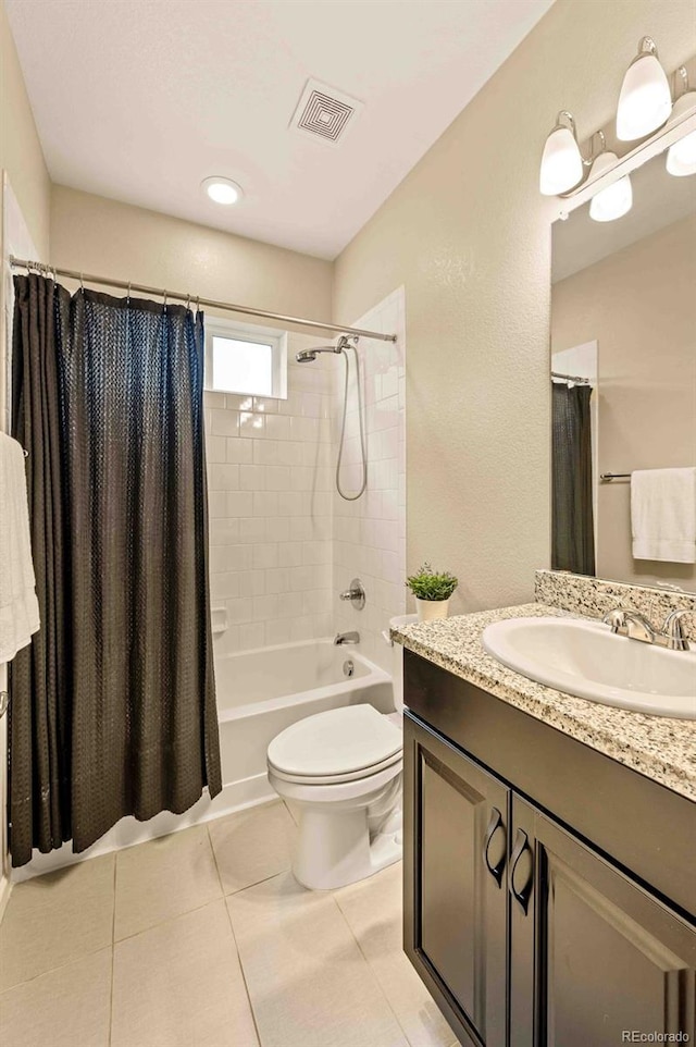 full bath featuring toilet, shower / tub combo, vanity, visible vents, and tile patterned floors