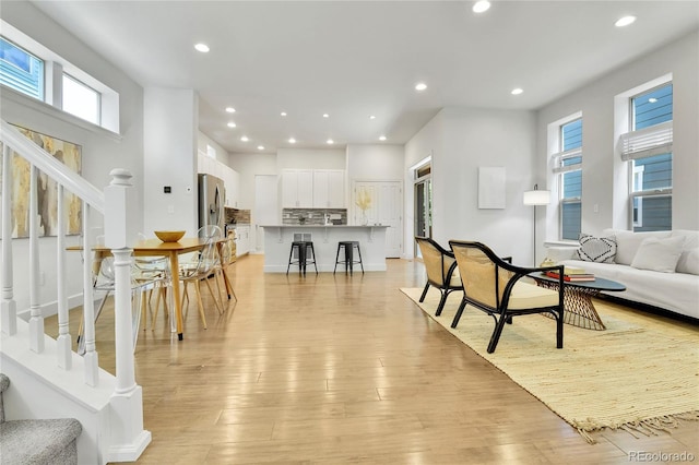 living room with light hardwood / wood-style floors