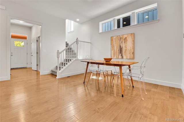 dining area with light hardwood / wood-style flooring