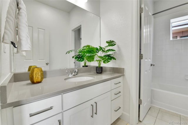 bathroom with vanity, shower / washtub combination, and tile patterned floors