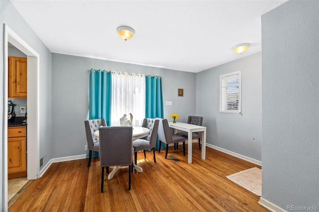 3492 S Elm St, Denver, CO 80222 - dining room with wood finished floors and baseboards