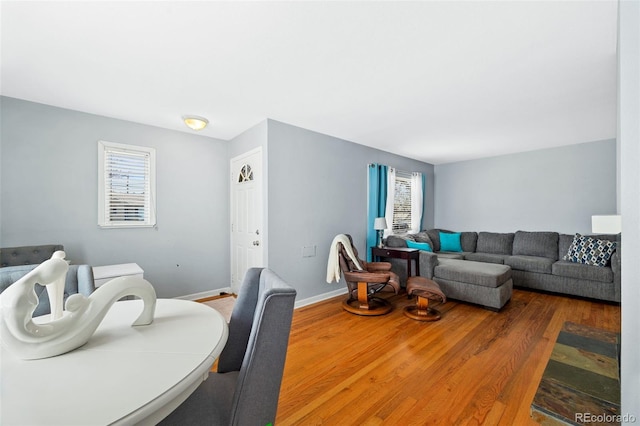 3492 S Elm St, Denver, CO 80222 - living room with wood finished floors, healthy amount of natural light, and baseboards