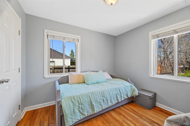 3492 S Elm St, Denver, CO 80222 - bedroom featuring baseboards and wood finished floors