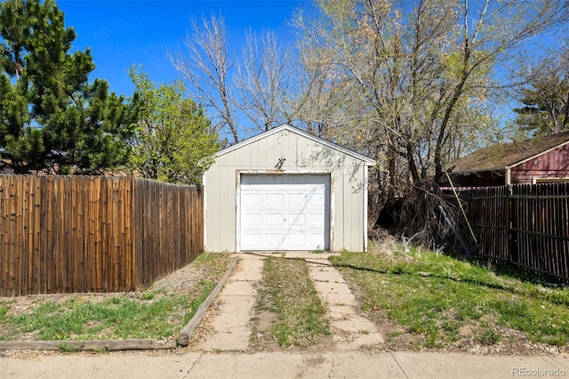 3492 S Elm St, Denver, CO 80222 - detached garage featuring fence and driveway
