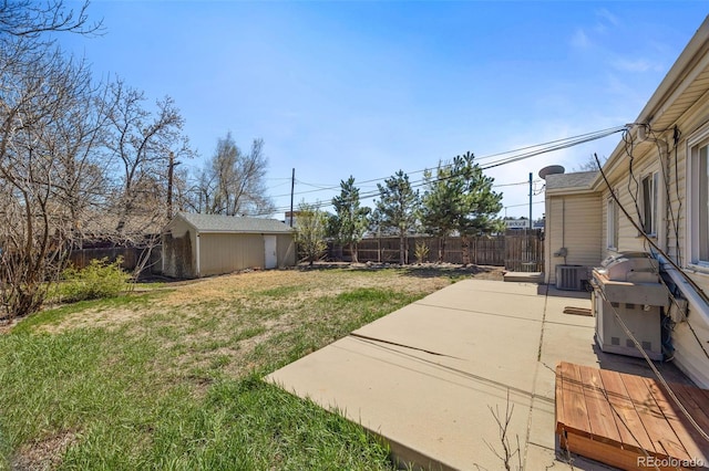 3492 S Elm St, Denver, CO 80222 - view of yard with a patio, central AC unit, an outbuilding, and a shed