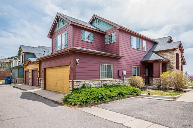 craftsman-style house featuring a garage