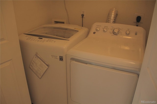 laundry area with washer and dryer