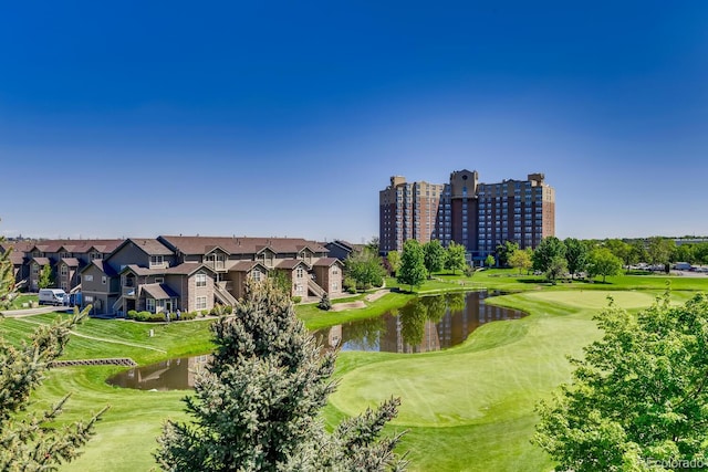 view of home's community with a water view