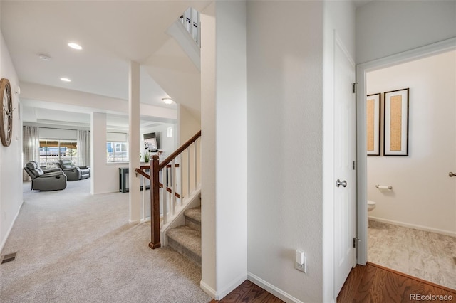 staircase with recessed lighting, carpet, visible vents, and baseboards