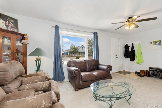 544 S 3rd Ave, Brighton, CO 80601 - carpeted living room featuring a ceiling fan