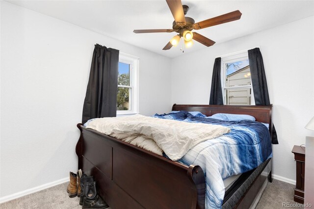 544 S 3rd Ave, Brighton, CO 80601 - bedroom with carpet, baseboards, and a ceiling fan