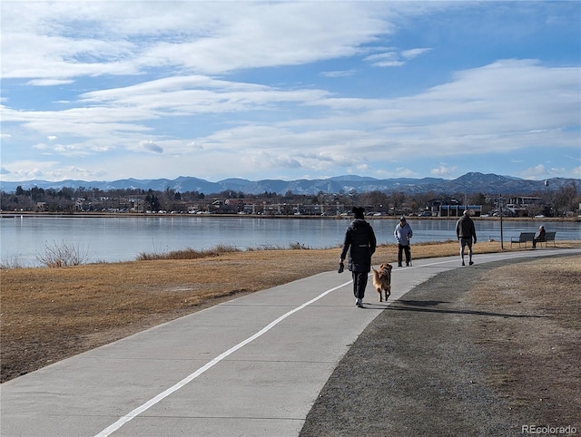 view of street with a water and mountain view