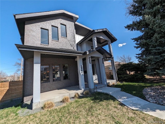 contemporary house with a front lawn