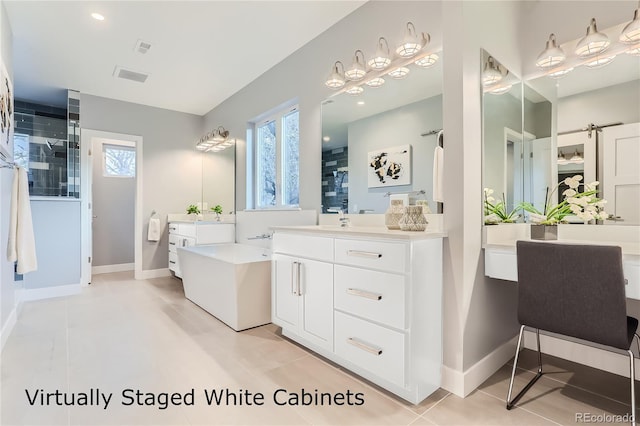 bathroom with visible vents, two vanities, a healthy amount of sunlight, and a stall shower