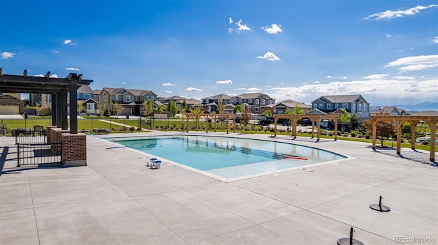 12941 Delaware St, Westminster, CO 80234 - community pool featuring a residential view, a patio area, and a pergola