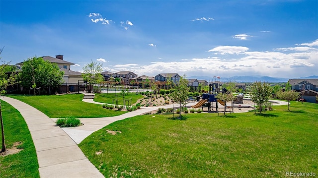 12941 Delaware St, Westminster, CO 80234 - view of property's community with a lawn and a residential view