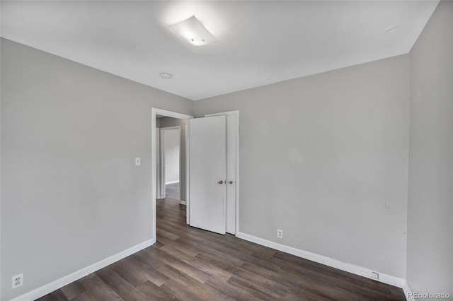 1801 S Eudora St, Denver, CO 80222 - empty room with baseboards, wood finished floors, and a smoke detector
