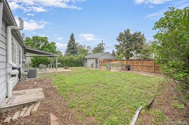 1801 S Eudora St, Denver, CO 80222 - view of yard featuring a patio area and central AC unit