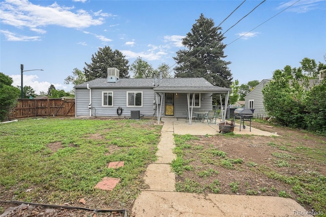 1801 S Eudora St, Denver, CO 80222 - rear view of house with a patio area, a fire pit, and central air condition unit