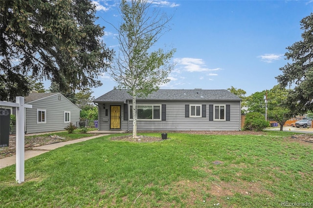 1801 S Eudora St, Denver, CO 80222 - view of front facade featuring a front lawn